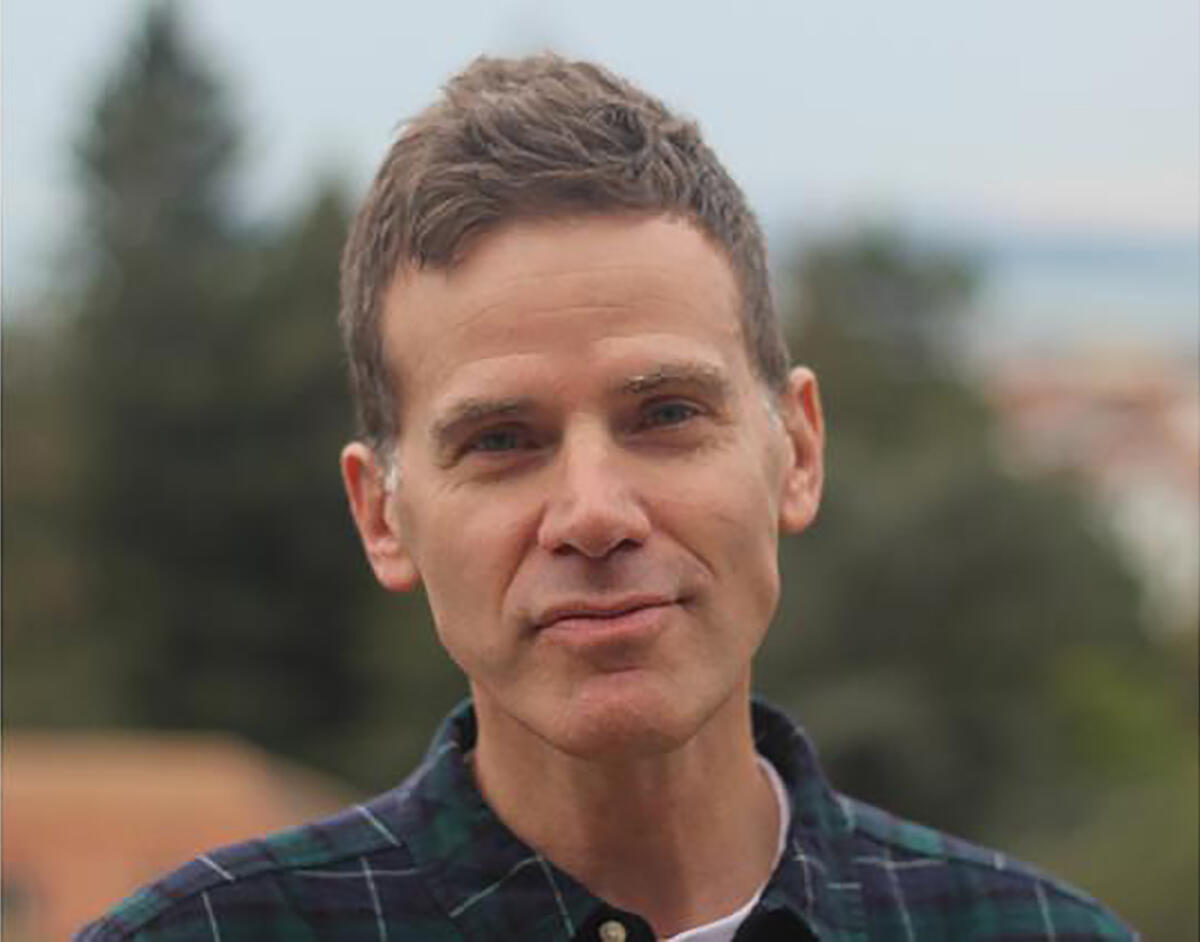 Head shot of Seth Lunine